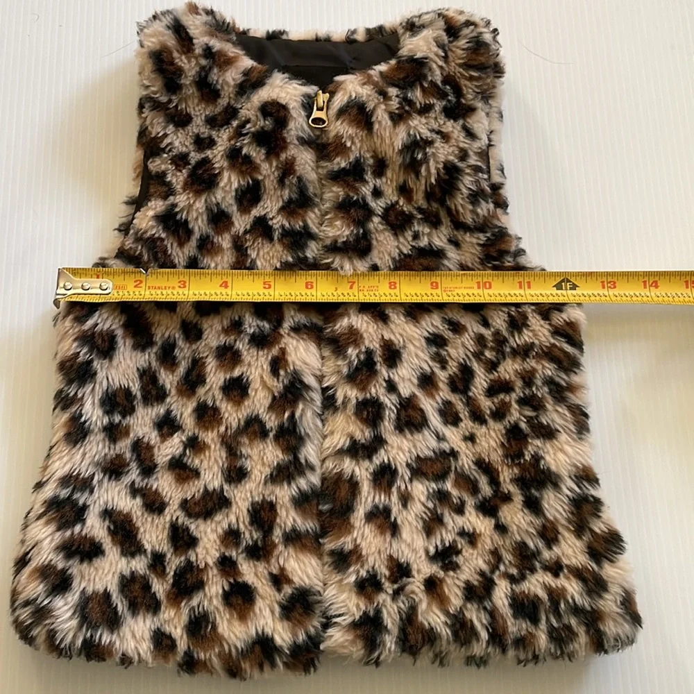 Me Jane black, brown & tan faux fur vest.  Girl’s size 7